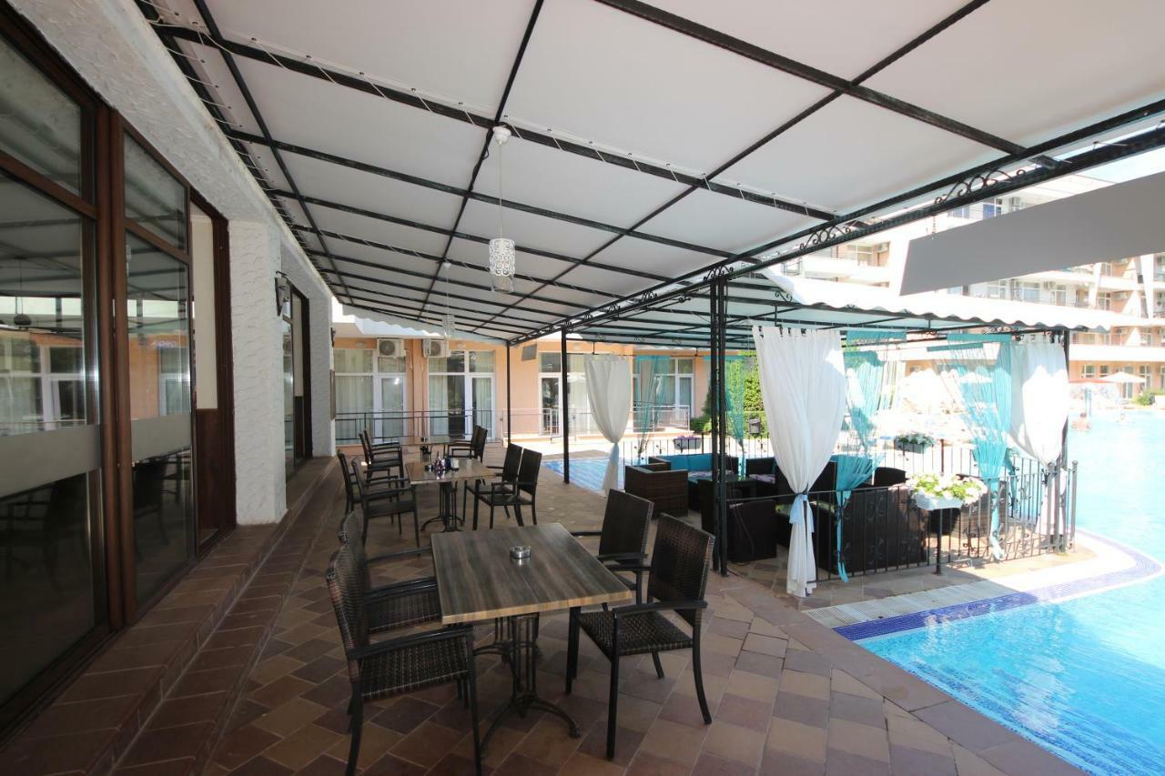 Menada Grand Kamelia Apartments Pantai Sunny Bagian luar foto