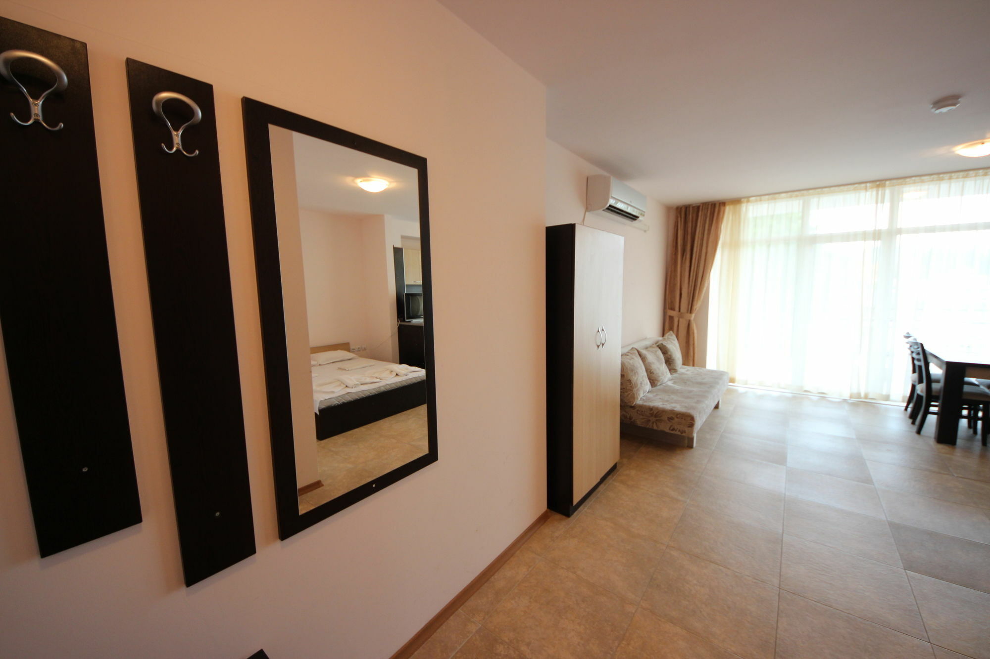 Menada Grand Kamelia Apartments Pantai Sunny Bagian luar foto